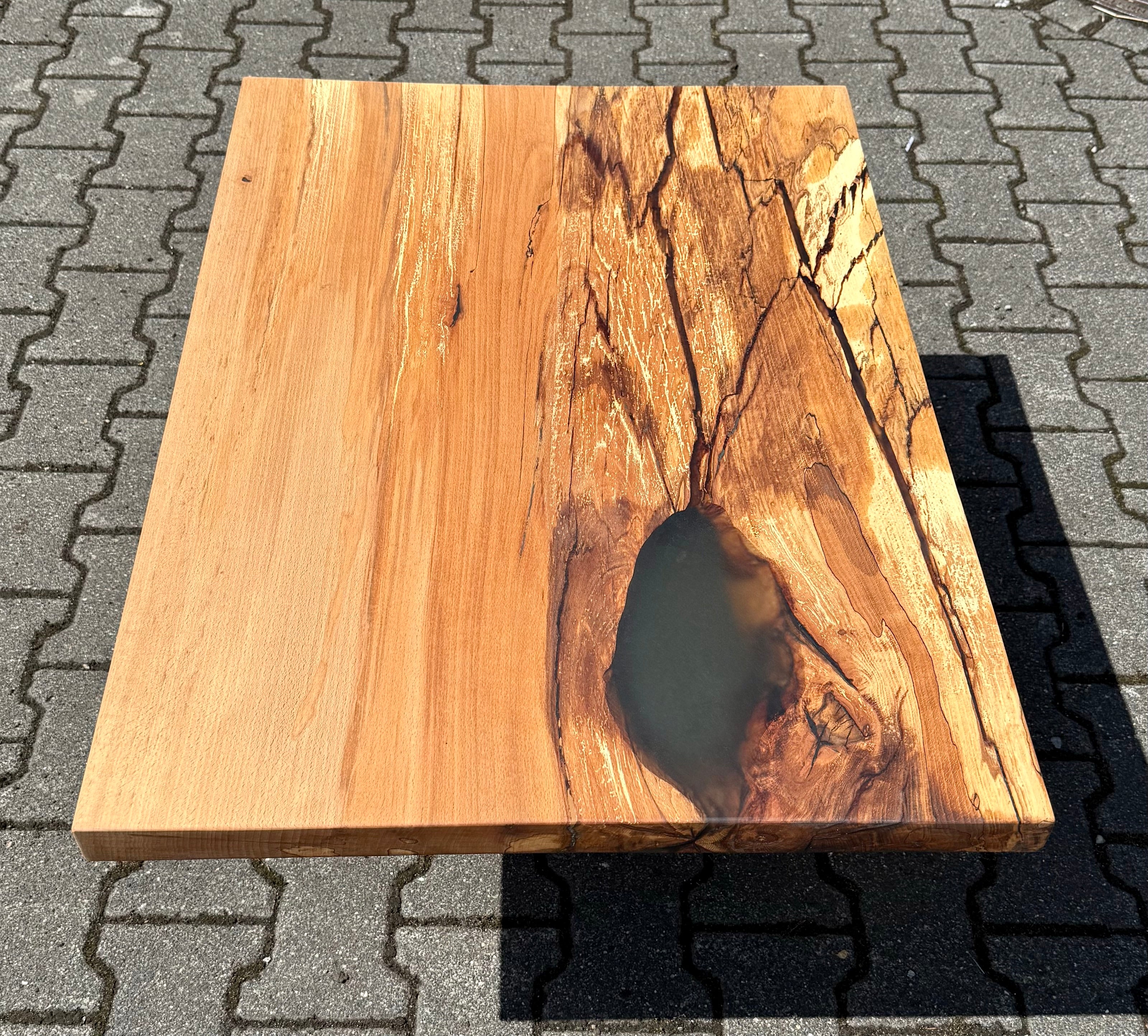 Epoxidharz Couchtisch Kürten Buche massiv 90 cm Massivholz geölt mit Spider Metall Gestell schwarz