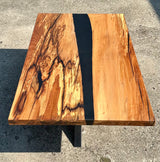 Epoxidharz River Couchtisch Kürten Buche massiv 110 cm Massivholz geölt mit Spider Metall Gestell schwarz