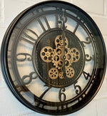 Lade das Bild in den Galerie-Viewer, Wanduhr Zahnrad Berlin Zählwerk Animation schwarz 55 cm
