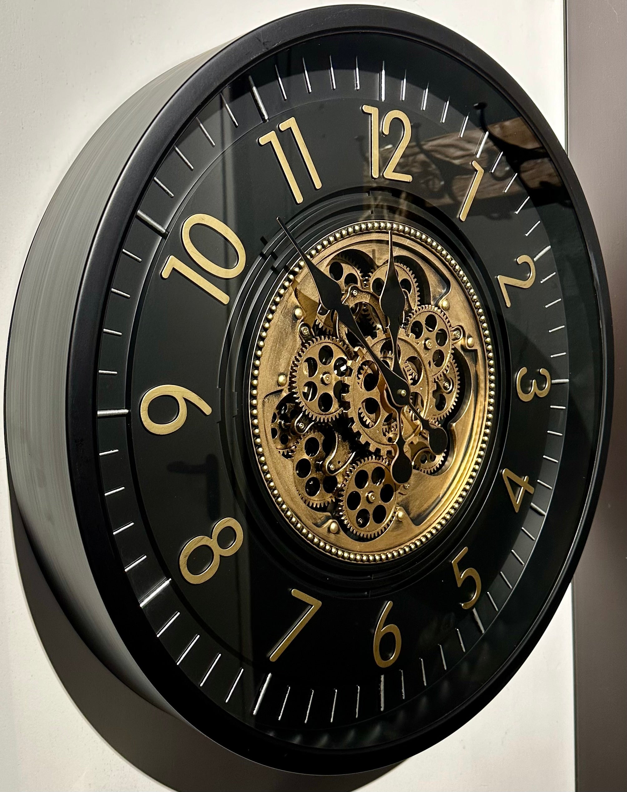 66 cm Zürich Wanduhr mit Zahnrädern schwarz gold