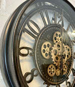 Lade das Bild in den Galerie-Viewer, Wanduhr Zahnrad Berlin Zählwerk Animation schwarz 55 cm
